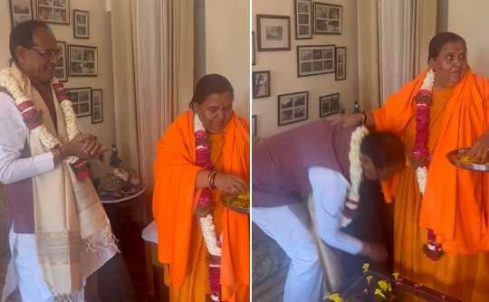 CM Shivraj visits Uma Bharti, touches her feet