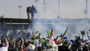 farmers protest tear gas shells fired at protesting