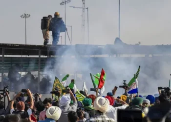 farmers protest tear gas shells fired at protesting