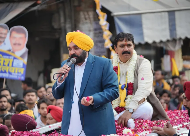 Delhi Election 2025, Bhagwant Mann, Arvind Kejriwal, BJP, Congress, Delhi Election Campaign, Punjab Government Achievements, Jhumla, Broom Symbol, Public Welfare, AAP, Kasturba Nagar, Chhatarpur, Mehraul, Election Speech, Zero Electricity Bill, Government Jobs, Women Empowerment, Delhi Voters, Election Promises, Road Show, Political Cleanliness