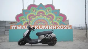 Maha Kumbh 2025, Ola Electric Scooters, Prayagraj Kumbh Mobility, Green Mobility Solutions, Maha Kumbh 2025 Transport, Eco-Friendly Solutions in Kumbh, Affordable Ride Kumbh Mela, Ola Electric at Kumbh, Green Transport at Kumbh, Sustainable Mobility Maha Kumbh।